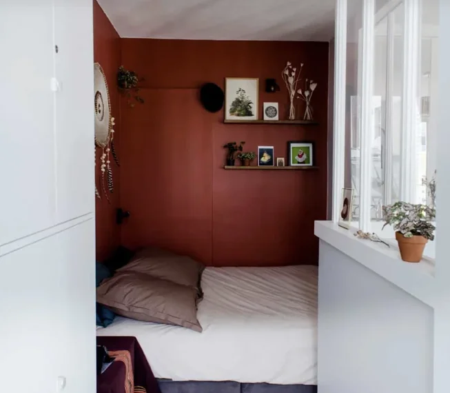 Bedroom — terracotta walls, intimate design