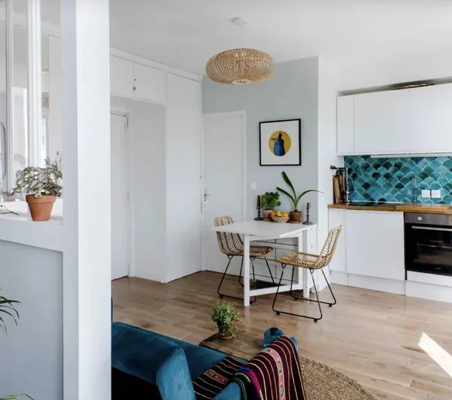 Open kitchen — turquoise zellige, wood worktop