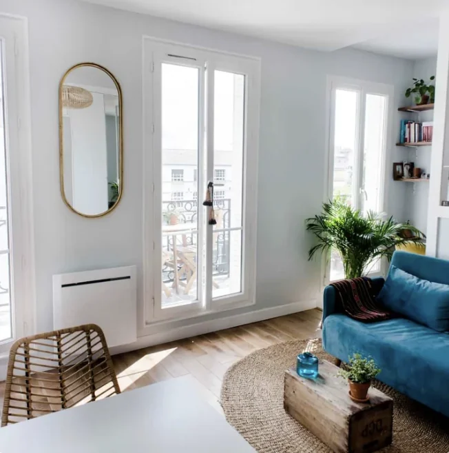 Living room — gold mirror, Haussmann balcony